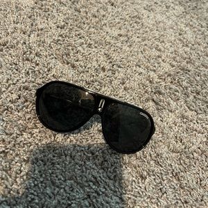 All black carrera sunglasses.